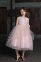 Stunning beaded dress with hand rolled rossette